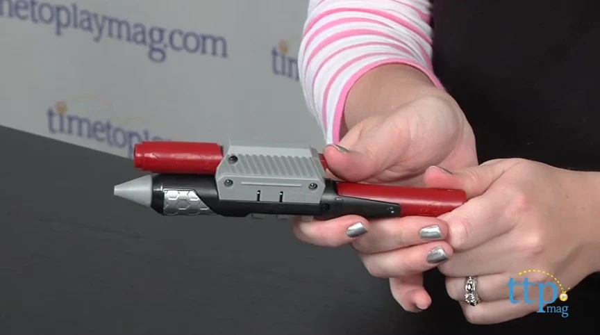 Close-up of the Micro Agent Motion Alarm being placed near a door.