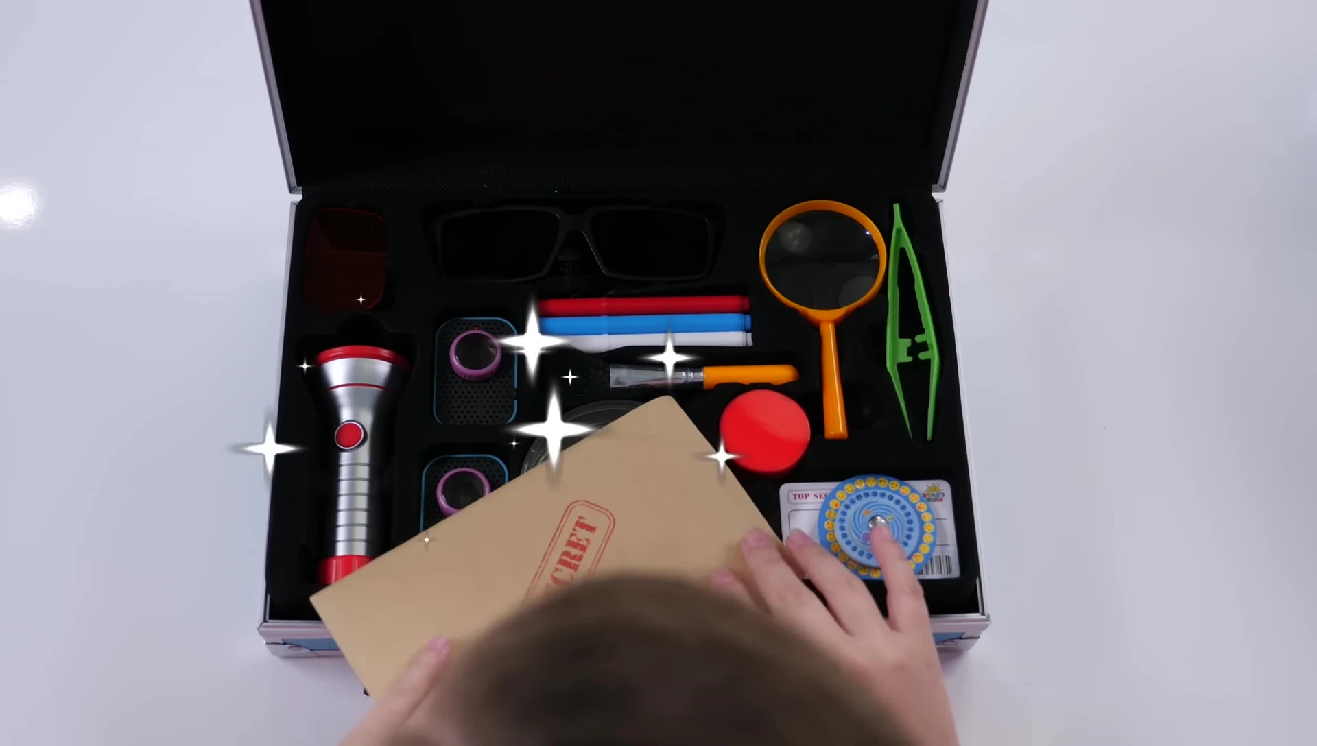 The Spy Kit open, showing some of the contents