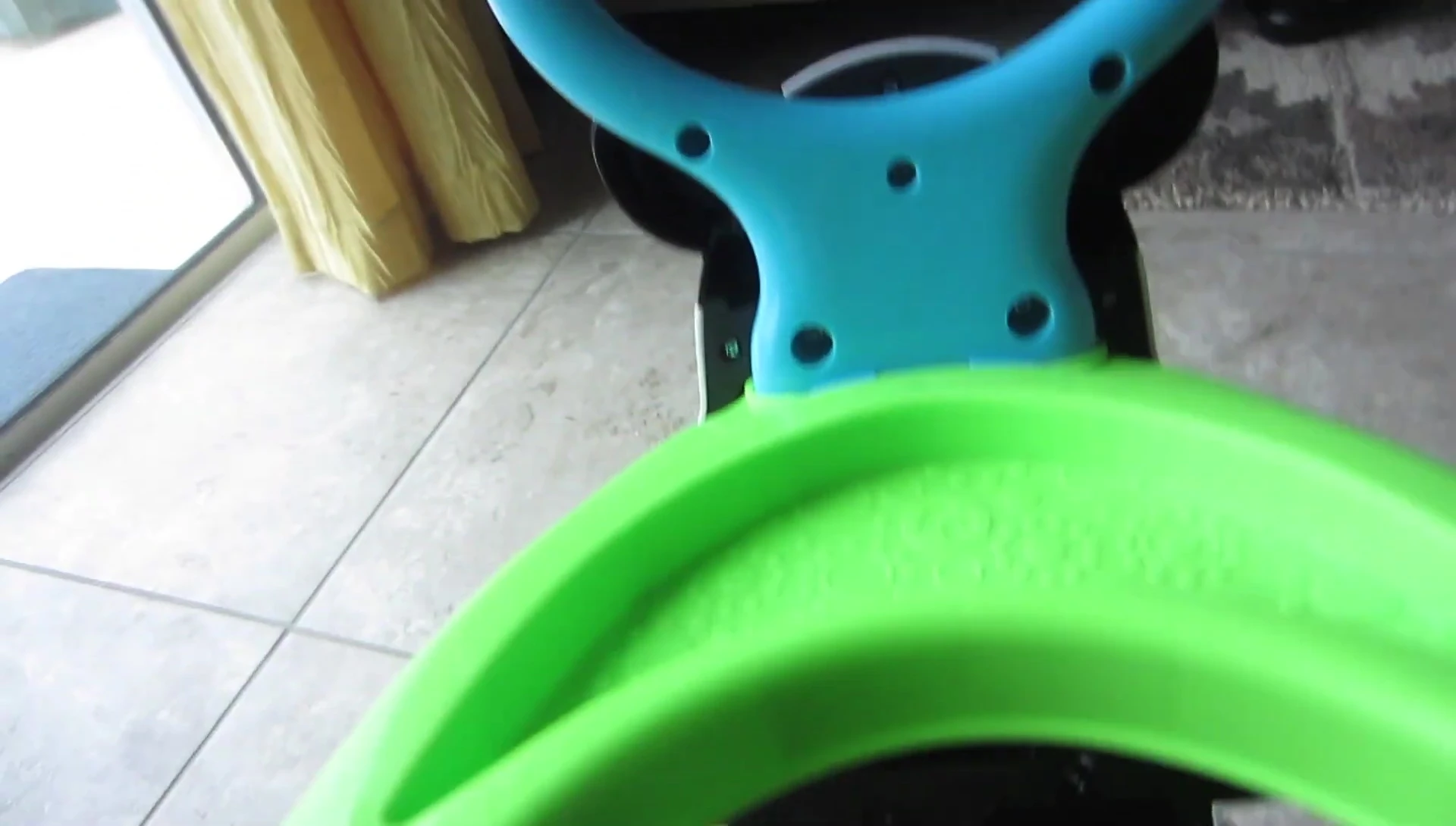 The screws securing the wheels.