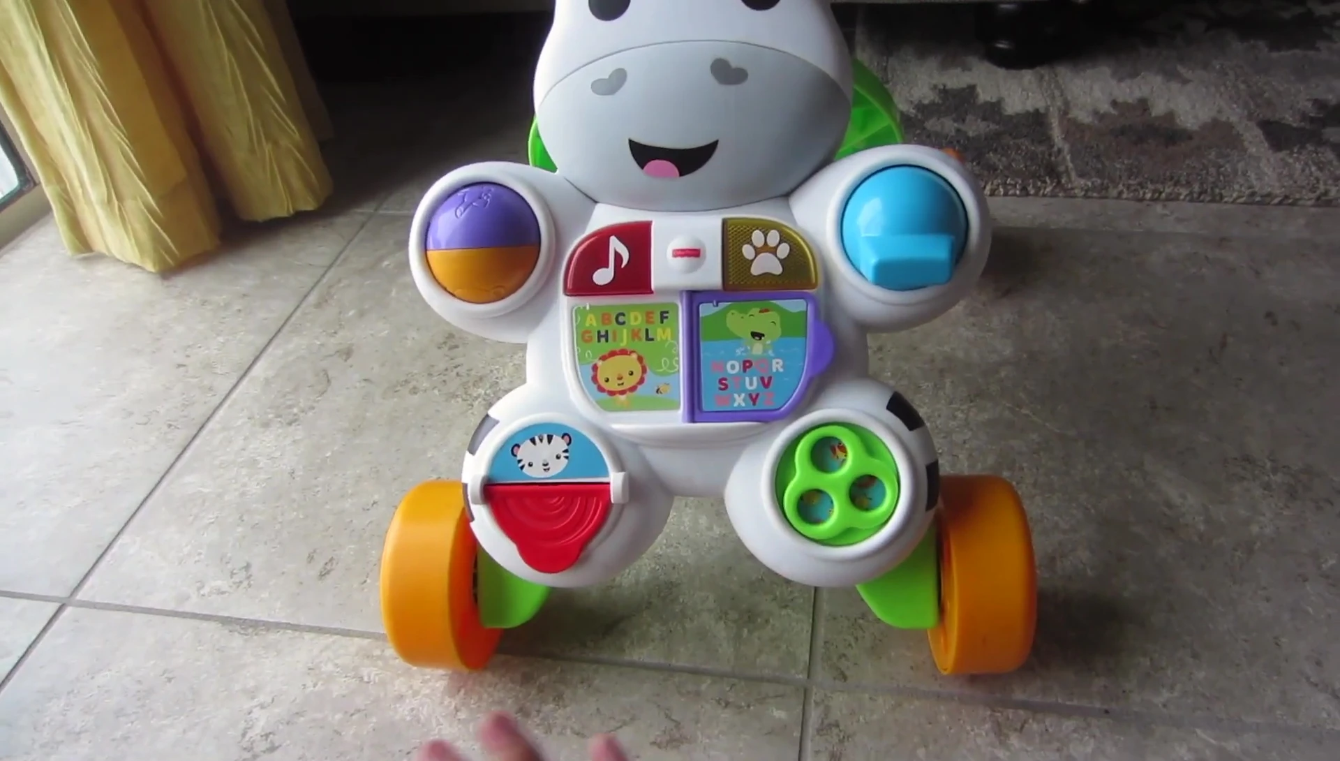 The interactive toys on the walker's activity panel.