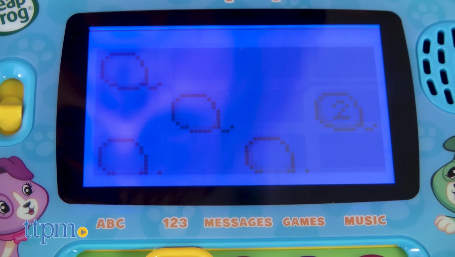 The touchscreen interface in tablet mode, showing the numbers mode with interactive balloons.
