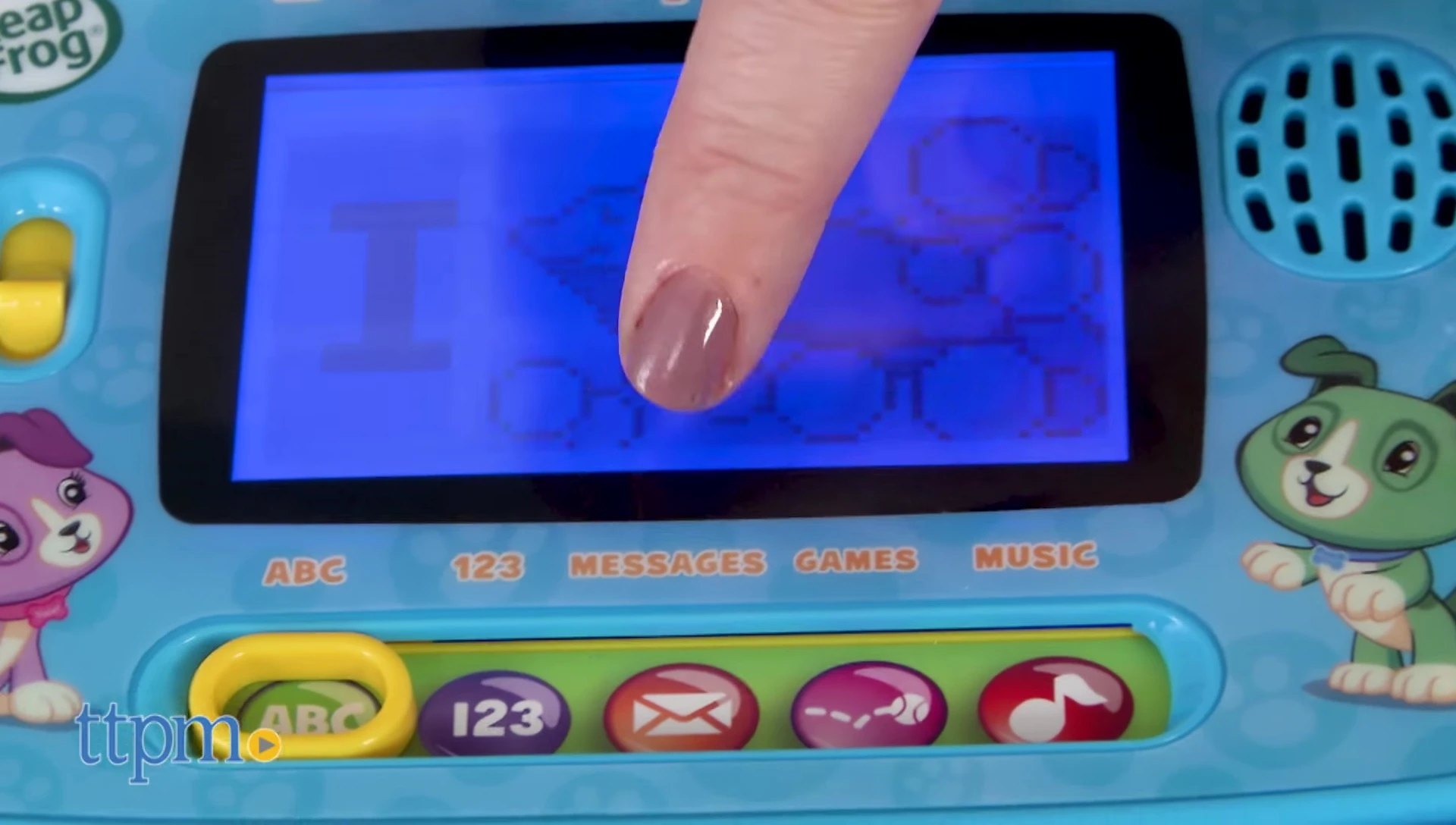 The LeapTop Touch in tablet mode, showing the letters mode with interactive bubbles.
