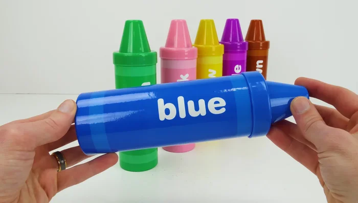 Roll out the blue Play-Doh and use cutters to create shapes.