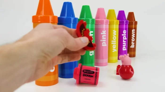 Roll out the red Play-Doh and use cutters to create shapes.