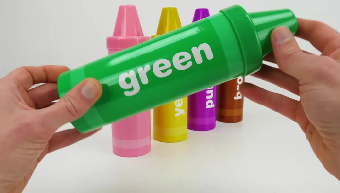 Roll out the green Play-Doh, use a roller and cutters to create shapes.