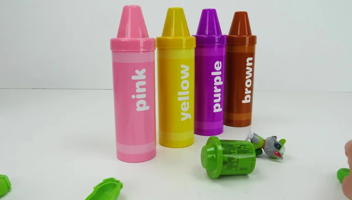 Roll out the green Play-Doh, use a roller and cutters to create shapes.