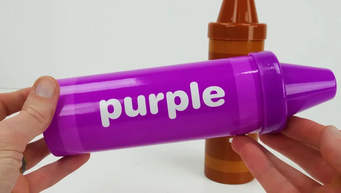 Roll out the purple Play-Doh and use cutters to create shapes.