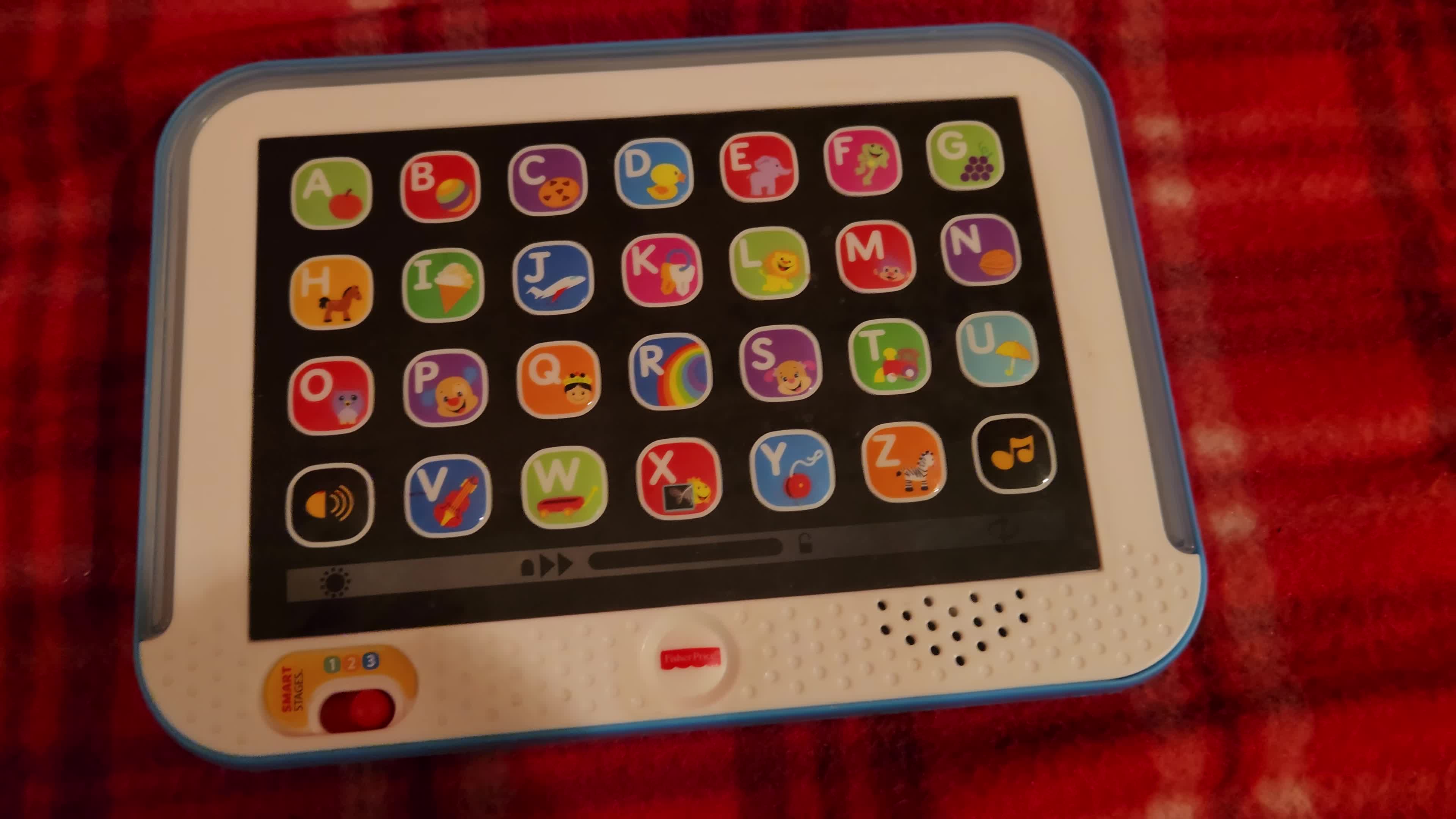 Overview of the tablet's front showing buttons and screen.