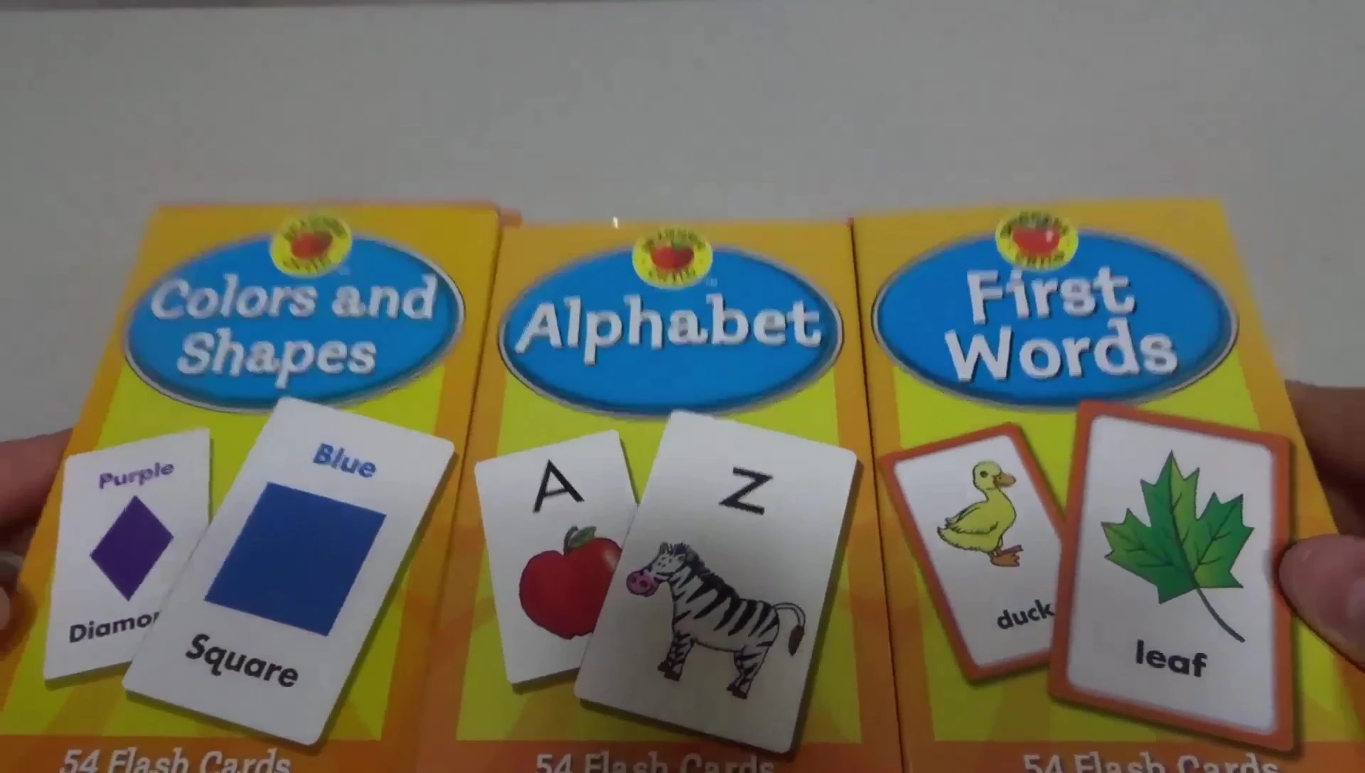 Three sets of Brighter Child Flash Cards: Colors & Shapes, Alphabet, and First Words.