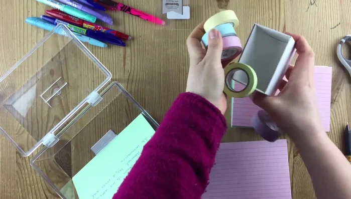 Create four sections within your flashcard box using dividers labeled 1-4.