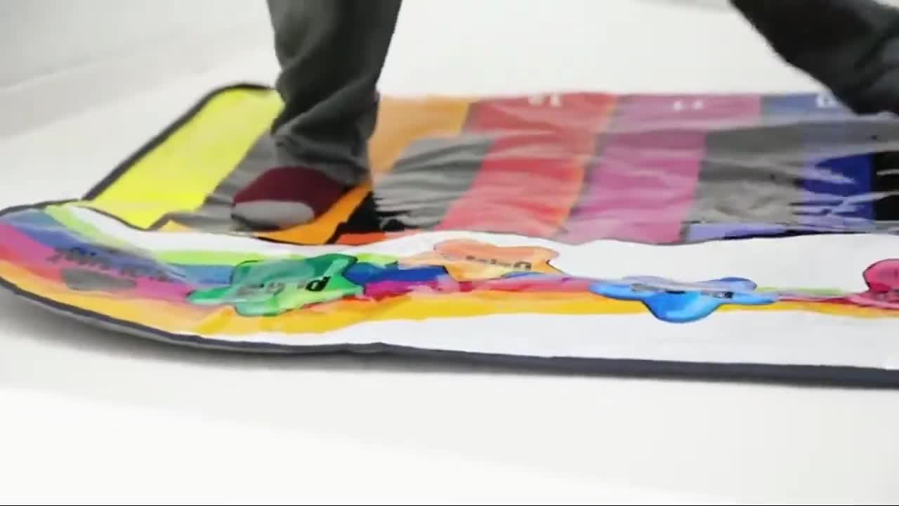 Close-up of the piano mat showing the keys and song cards