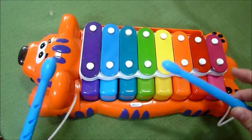 Close-up of the piano keys being played
