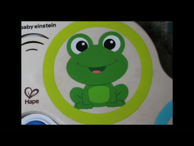 A close-up of the blue button that activates different sounds