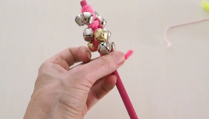 Twist the second pipe cleaner tightly at the top and tuck the ends.