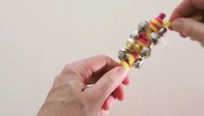 Twist the second pipe cleaner tightly at the top and tuck the ends.