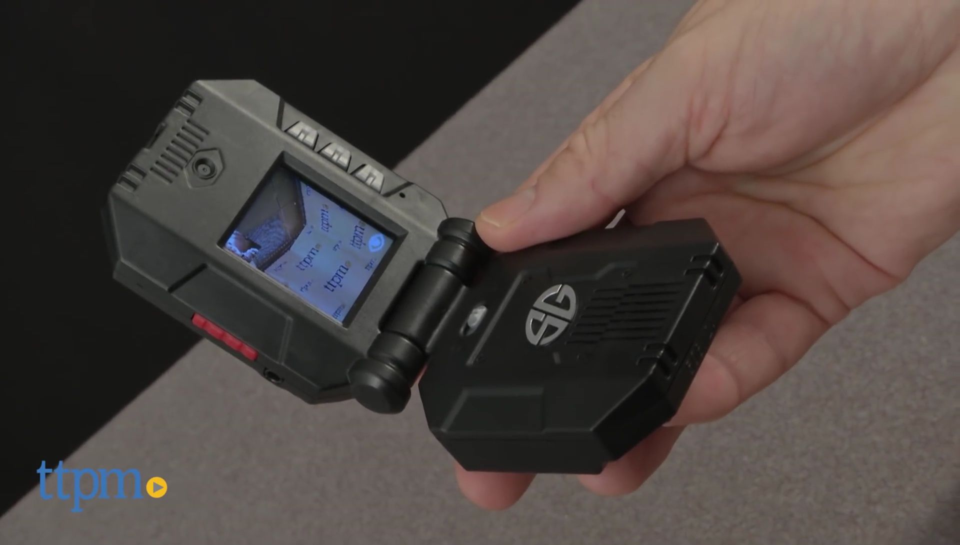 Walkie-talkie shown closed, highlighting the clamshell design.