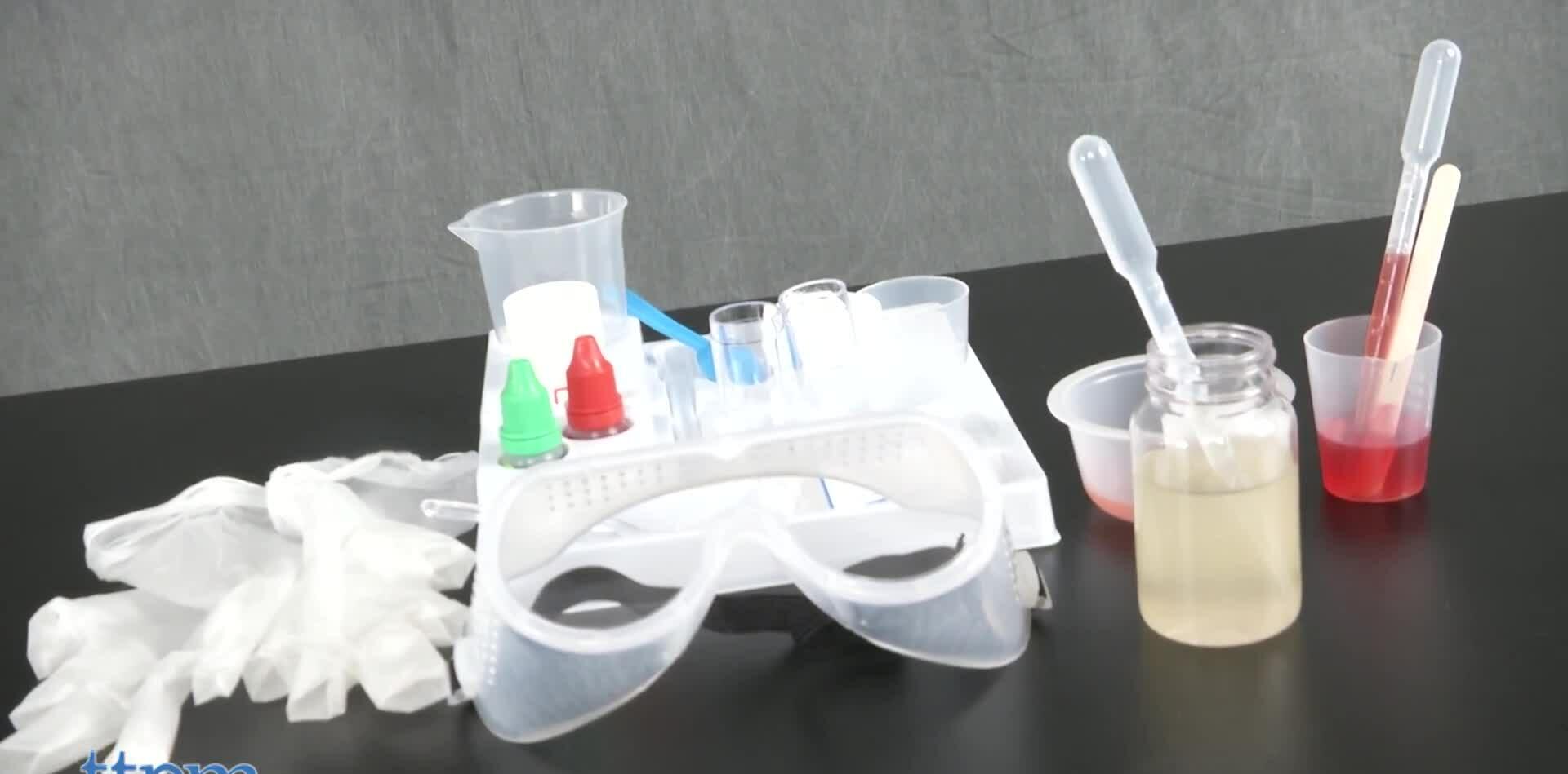 Close-up shot of the Science Academy Slime Lab kit box and its contents