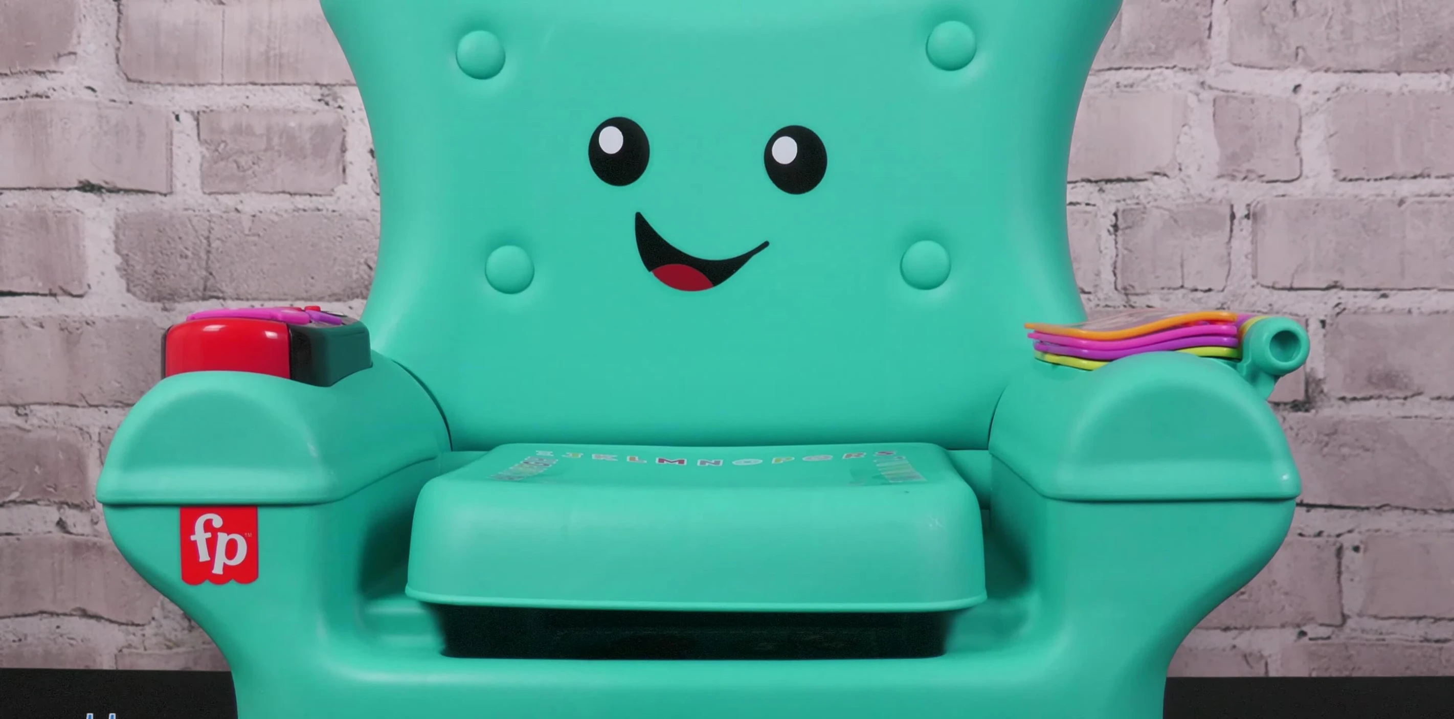 Child lifting the seat of the chair to reveal hidden surprises