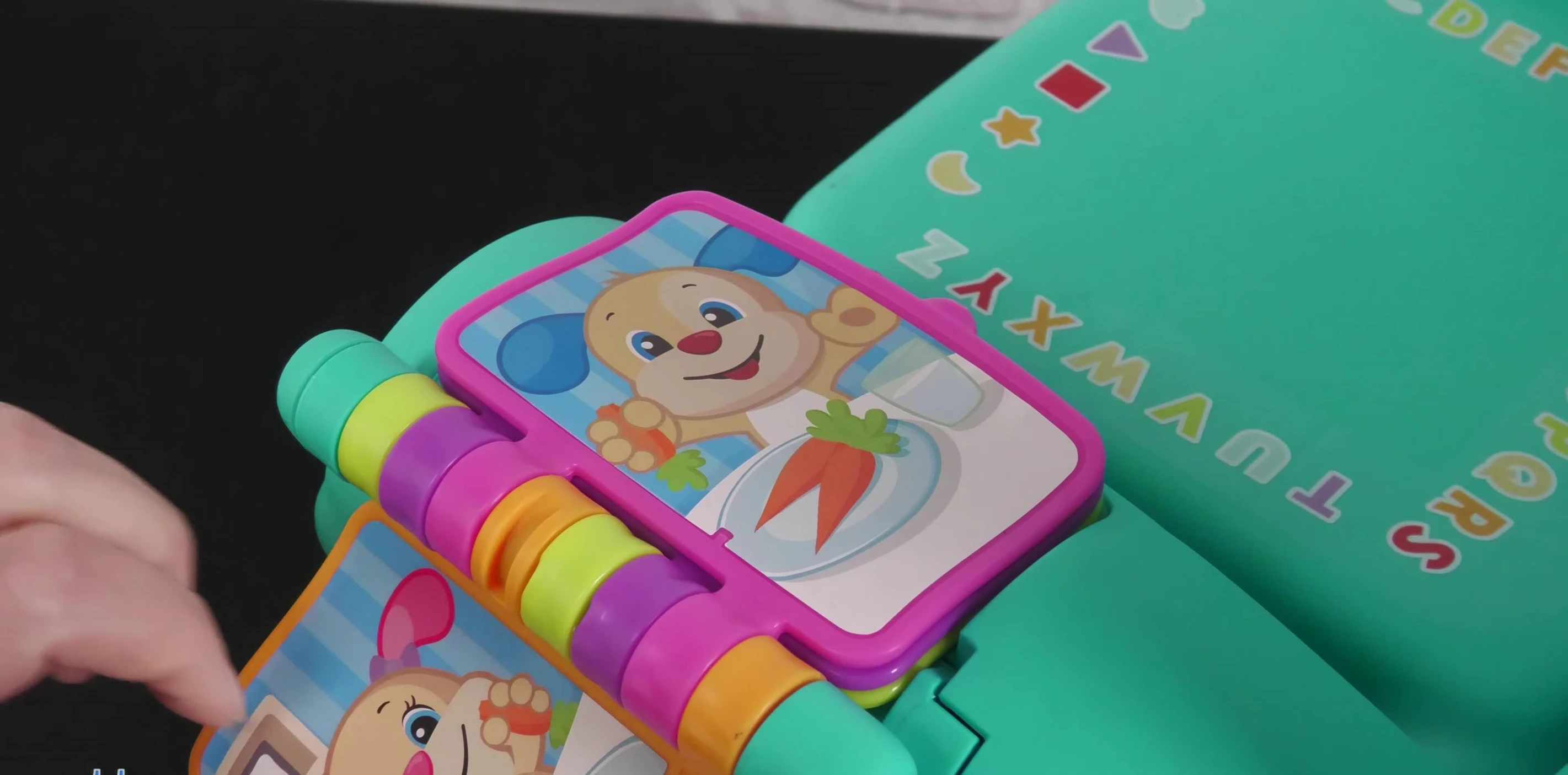 Close-up of the book attached to the chair's armrest