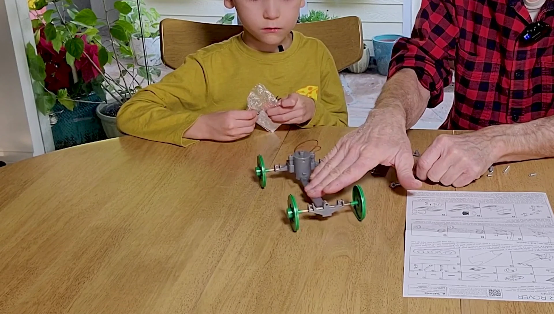 Applying stickers to the Solar Rover