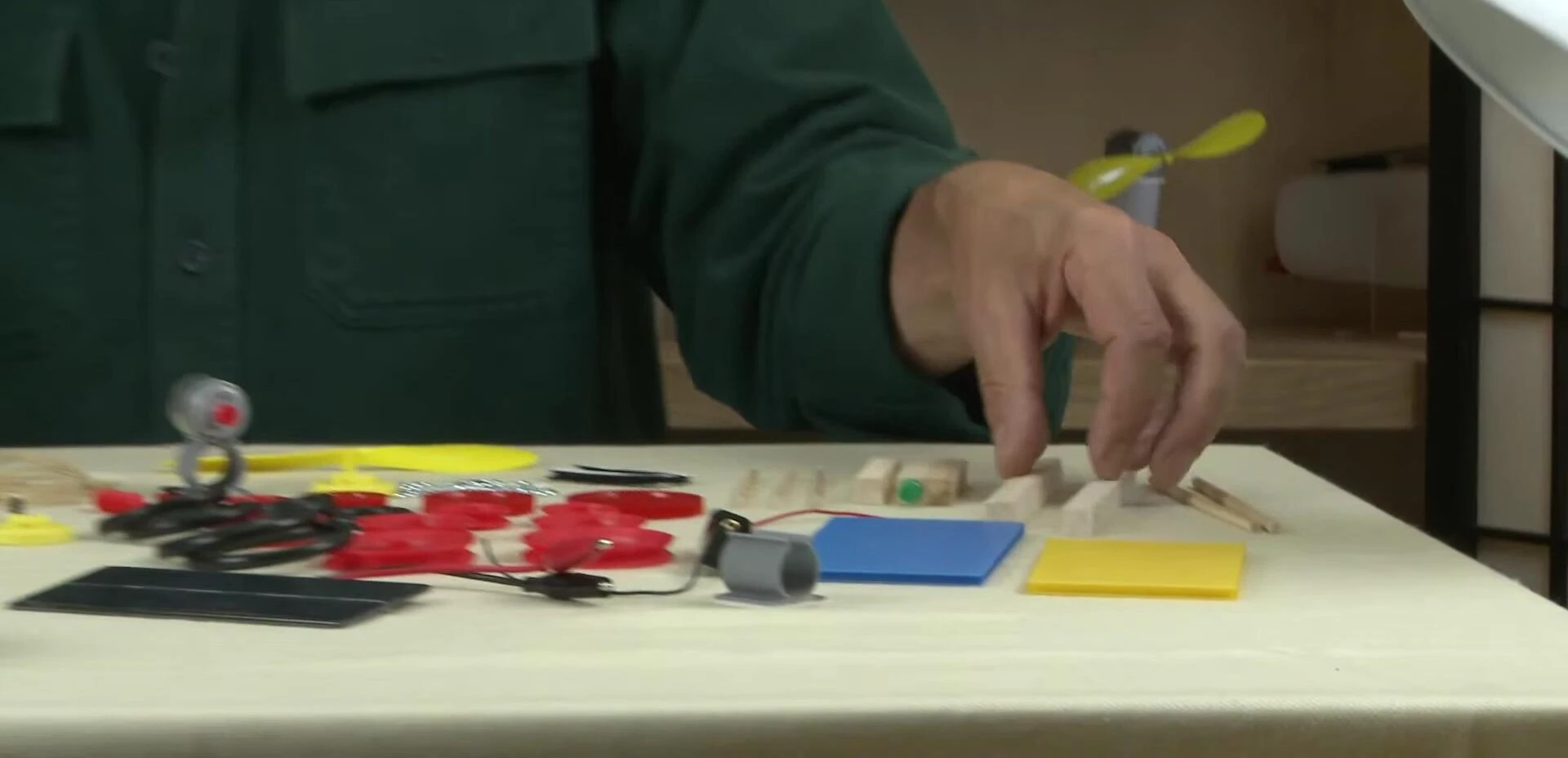 Variety of dowels, gears, and pulleys