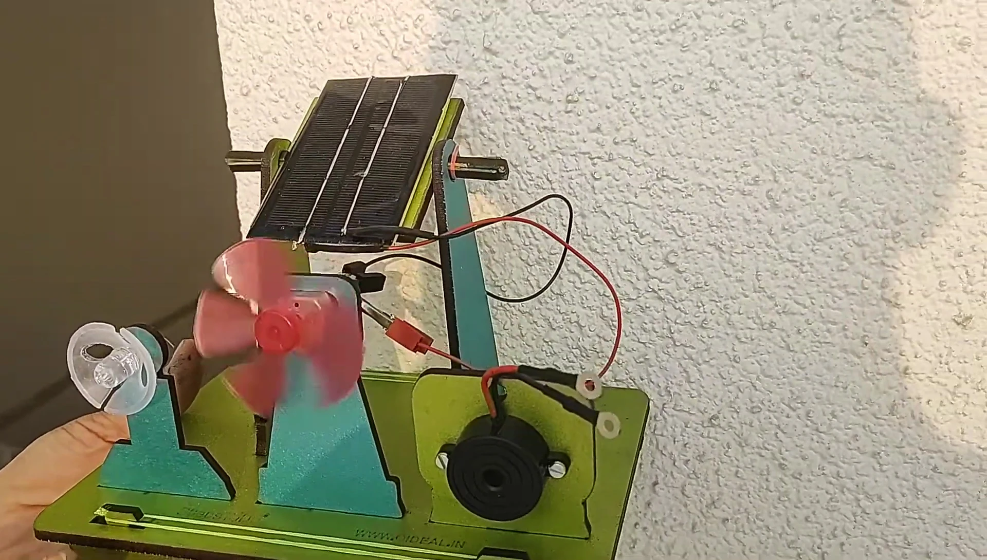 The motor spinning vigorously under direct sunlight