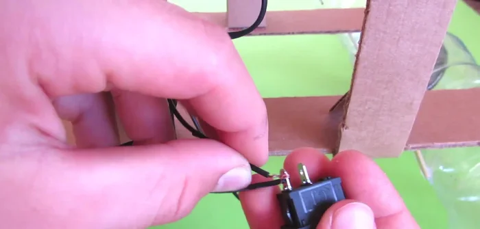 Connect the solar panel wires to the switch and motors. Connect one positive wire from each solar panel pair to one switch contact; connect the remaining wires to the other switch contact.