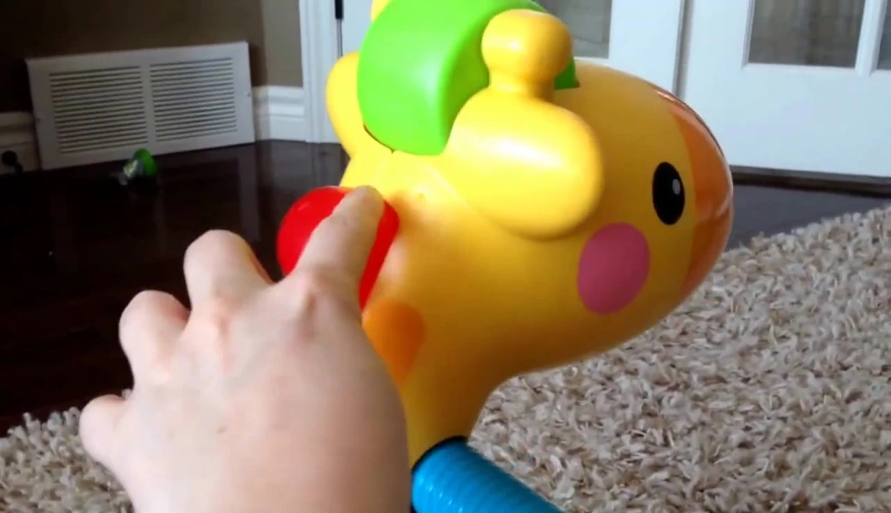 Overview of the toy, highlighting the absence of buttons.