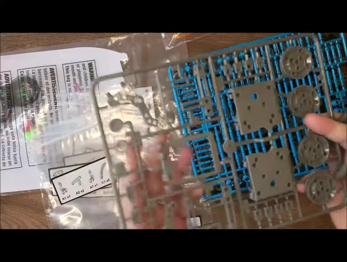 Carefully cut out all plastic pieces from the sheets, using angled cutters. File down any rough edges.