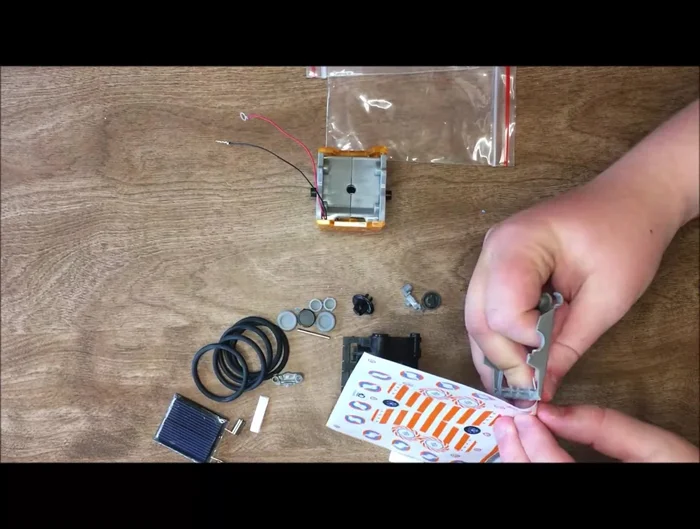 Apply stickers to the robot's body.