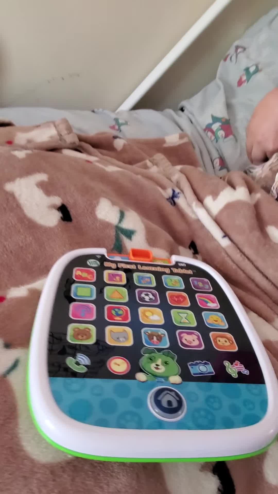 Close-up of the tablet's on/off switch and volume control.
