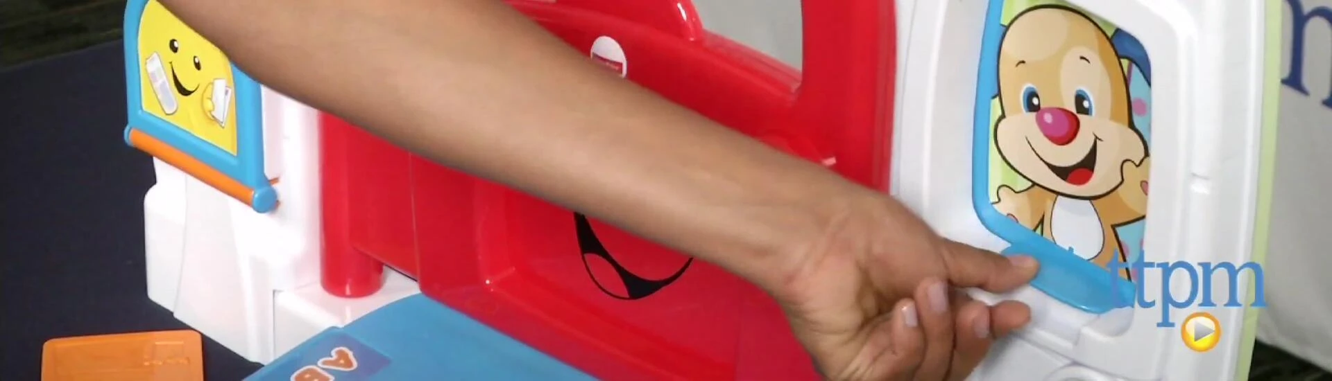 The toy showcasing its educational elements – letters, numbers and shapes.