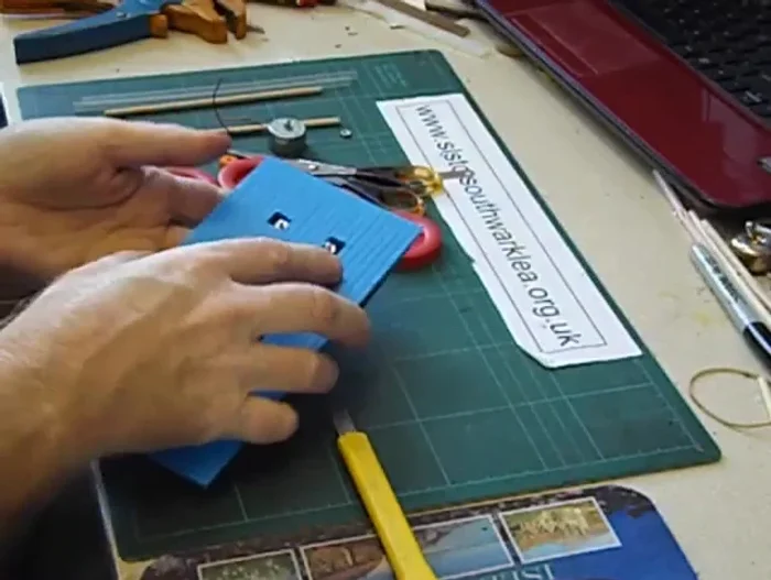 Glue solar cells onto Couric's.