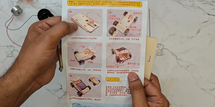 Assemble the gear mechanism: Fit the smaller gear into the motor, then attach larger gear to the rod.