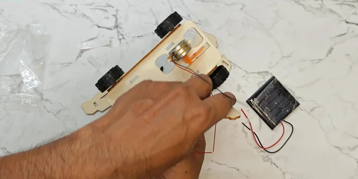 Install side pieces: Attach the remaining side pieces to the car's chassis.