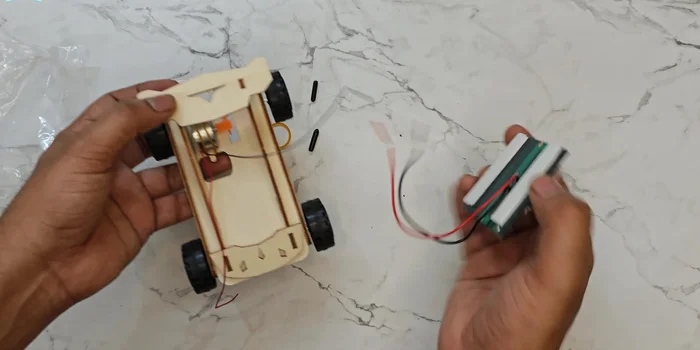 Connect the wires: Carefully connect the black and red wires to their corresponding terminals, ensuring proper insulation to prevent short circuits.
