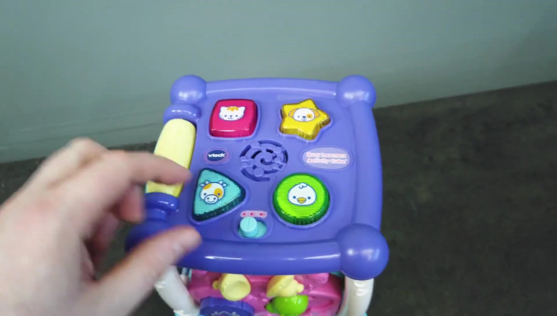 Close-up of the buttons and spinning elements on the cube