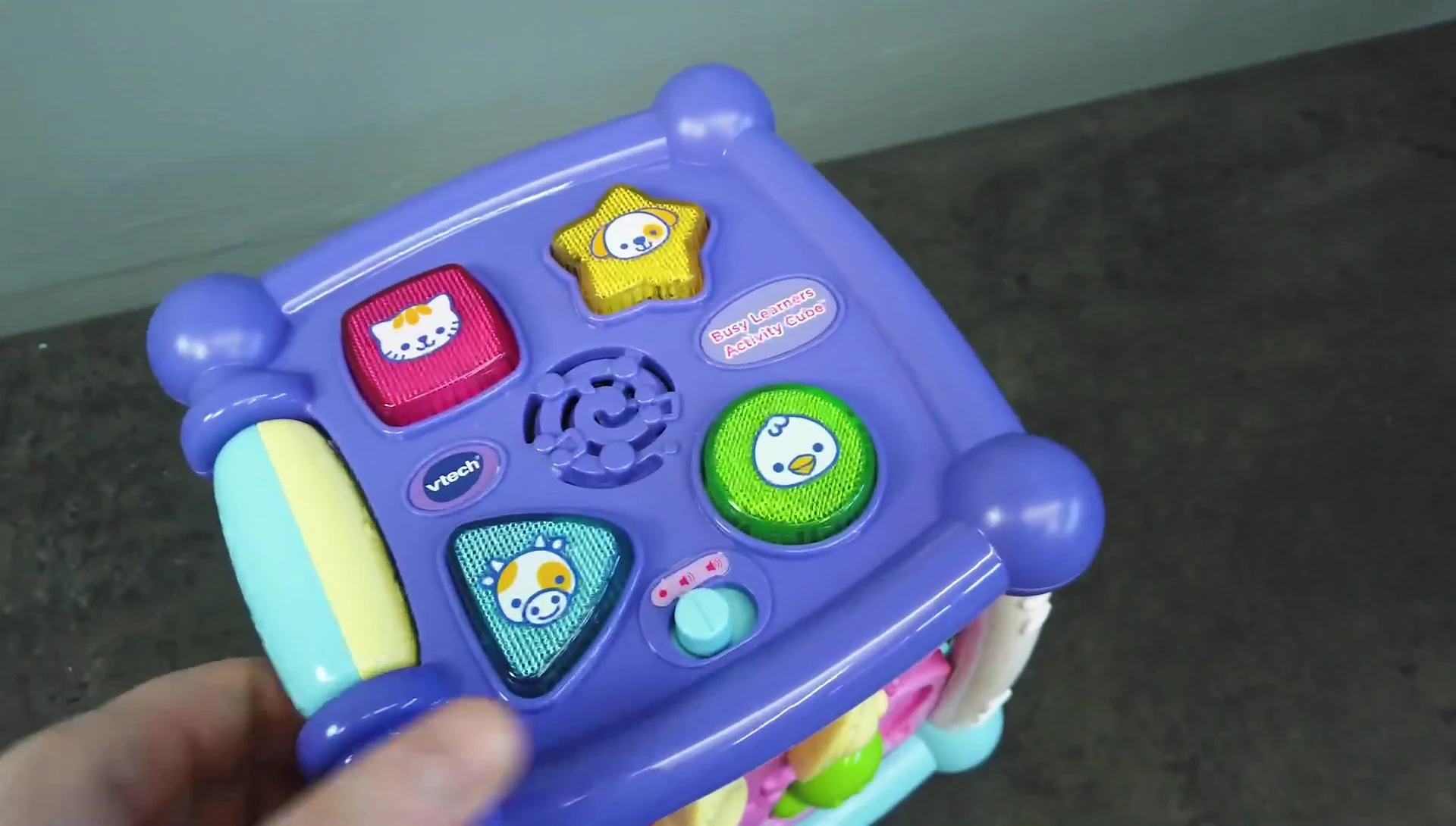 Close-up of the buttons showing shapes, colors, and animals