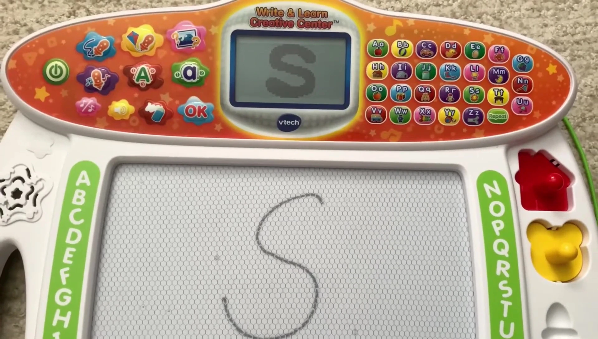 Screen showing name writing practice.
