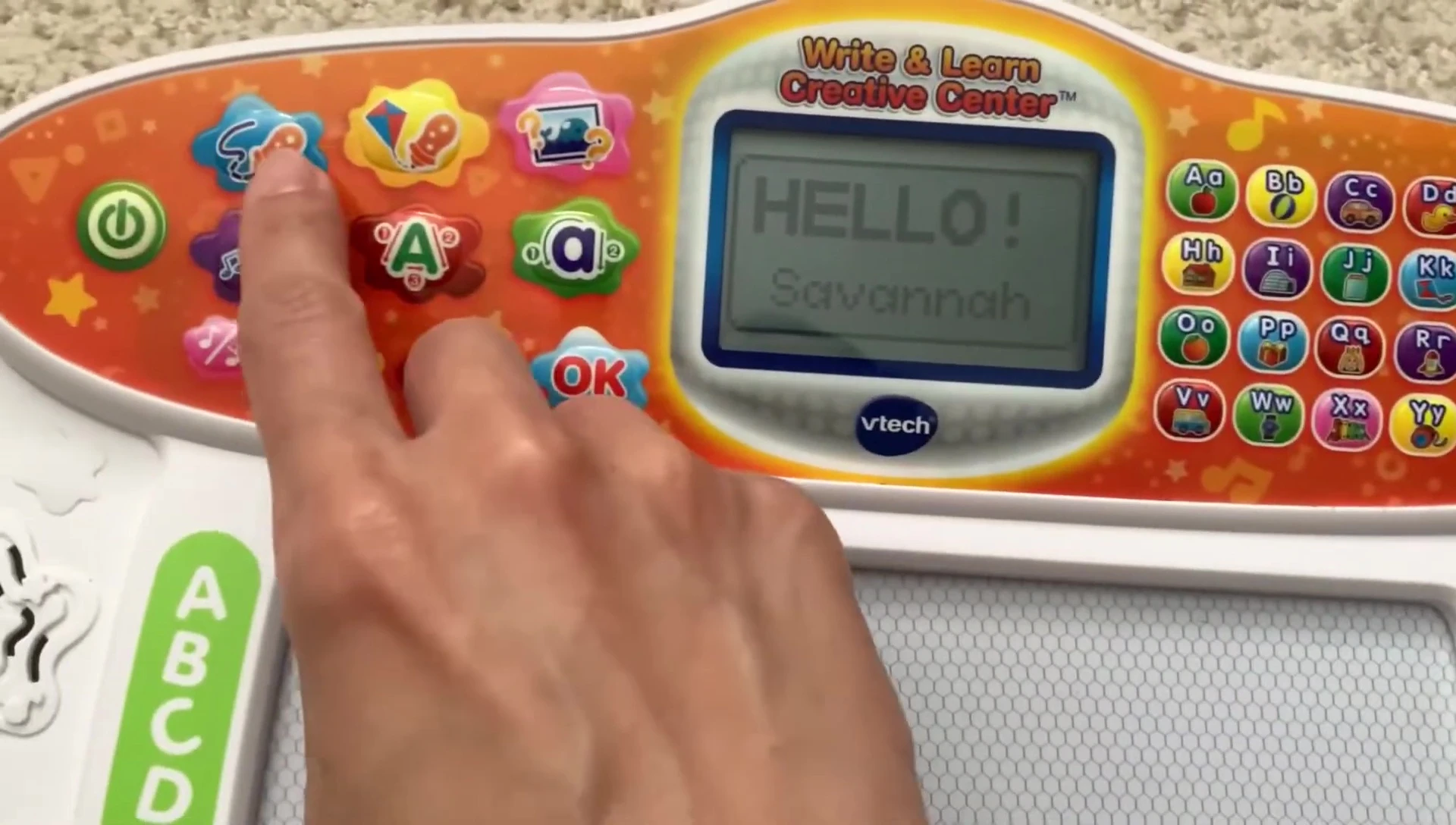 Close-up of the activity buttons on the VTech Write & Learn Creative Center.