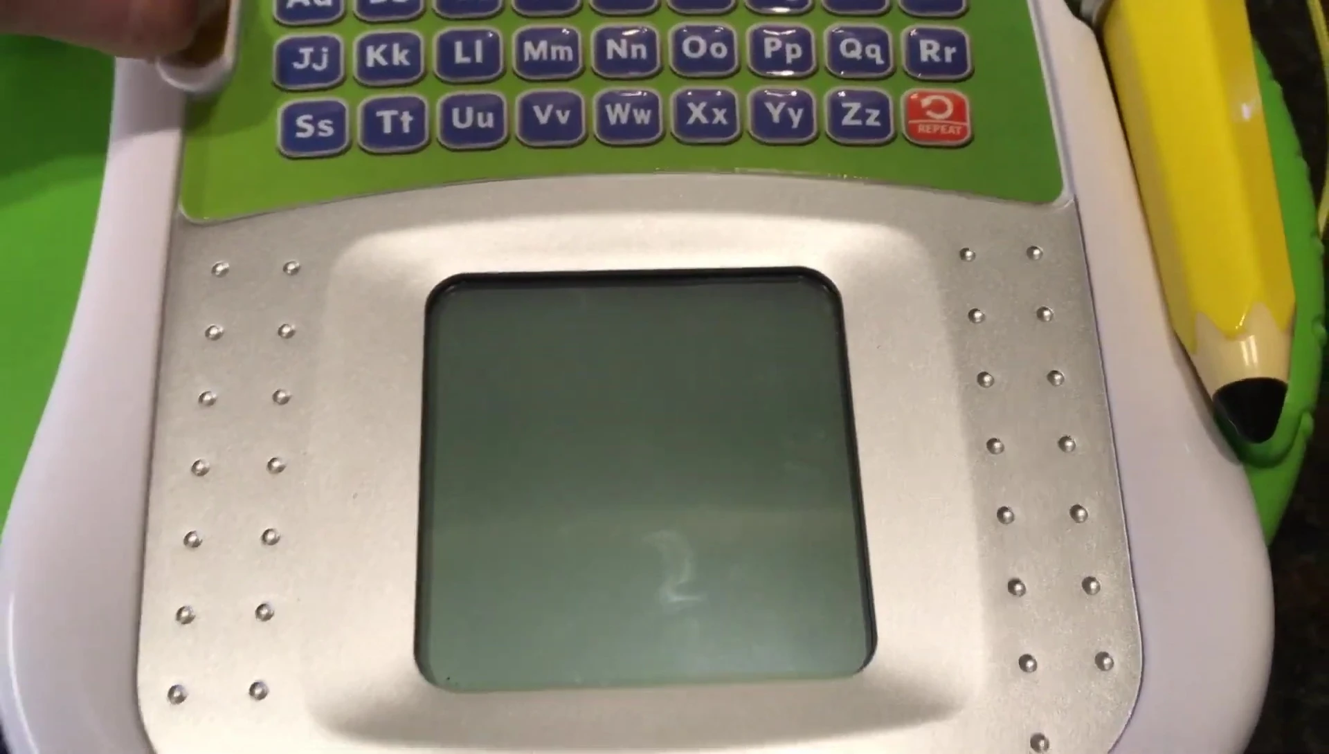 The reviewer demonstrating the use of a finger as input.