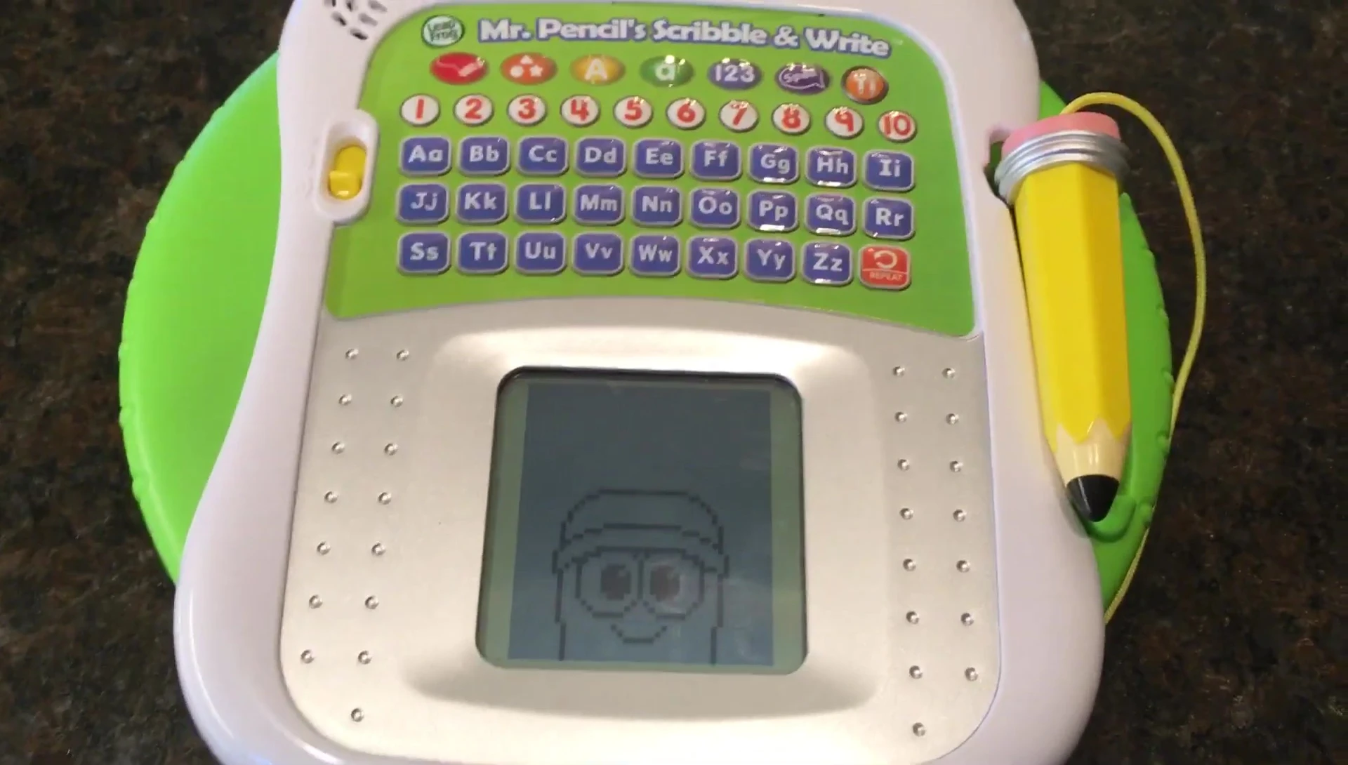 Close-up of the Leapfrog Mr. Pencil device showing the screen and stylus.