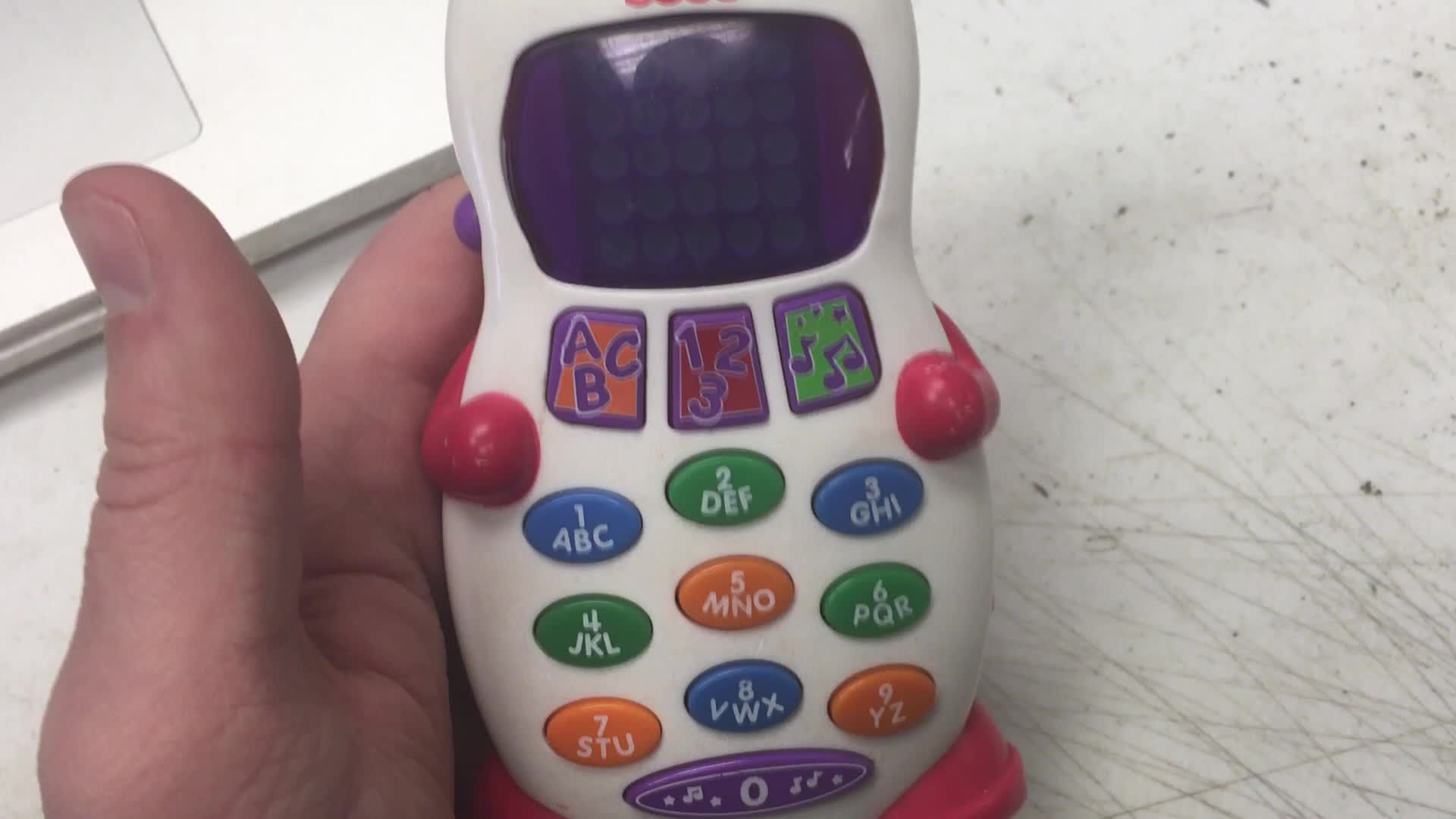 Close-up shot of the Fisher-Price Laugh & Learn Phone box.