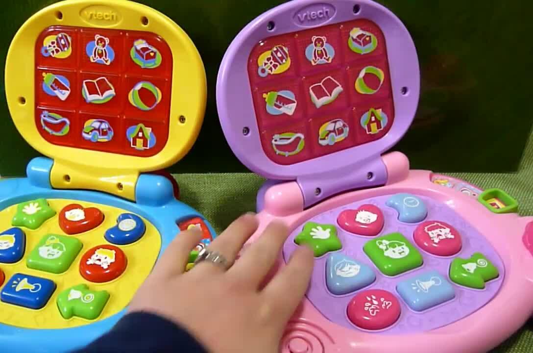 Pink and multi-colored laptops side-by-side