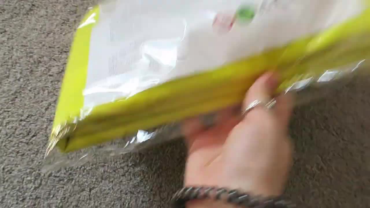 The piano mat in its cellophane packaging.