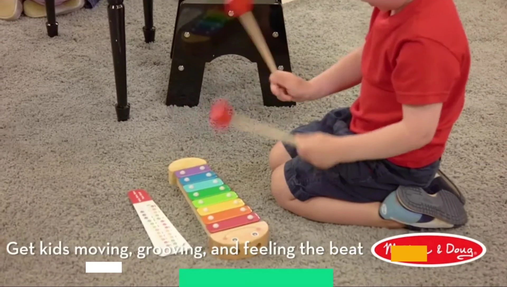 Melissa & Doug Learn to Play Piano showcasing its design and keys.