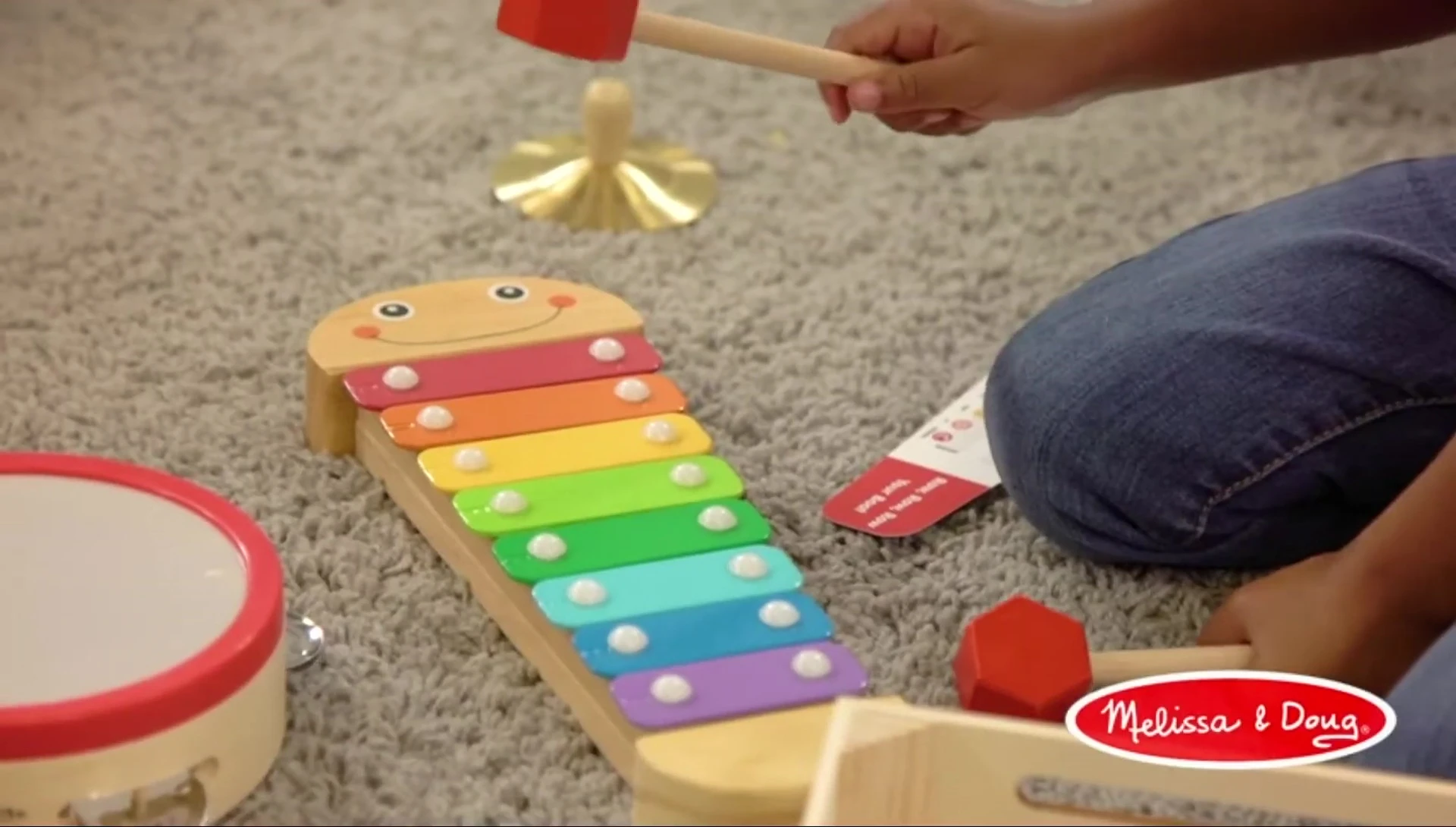 Close-up view highlighting the piano's color-coded music book.