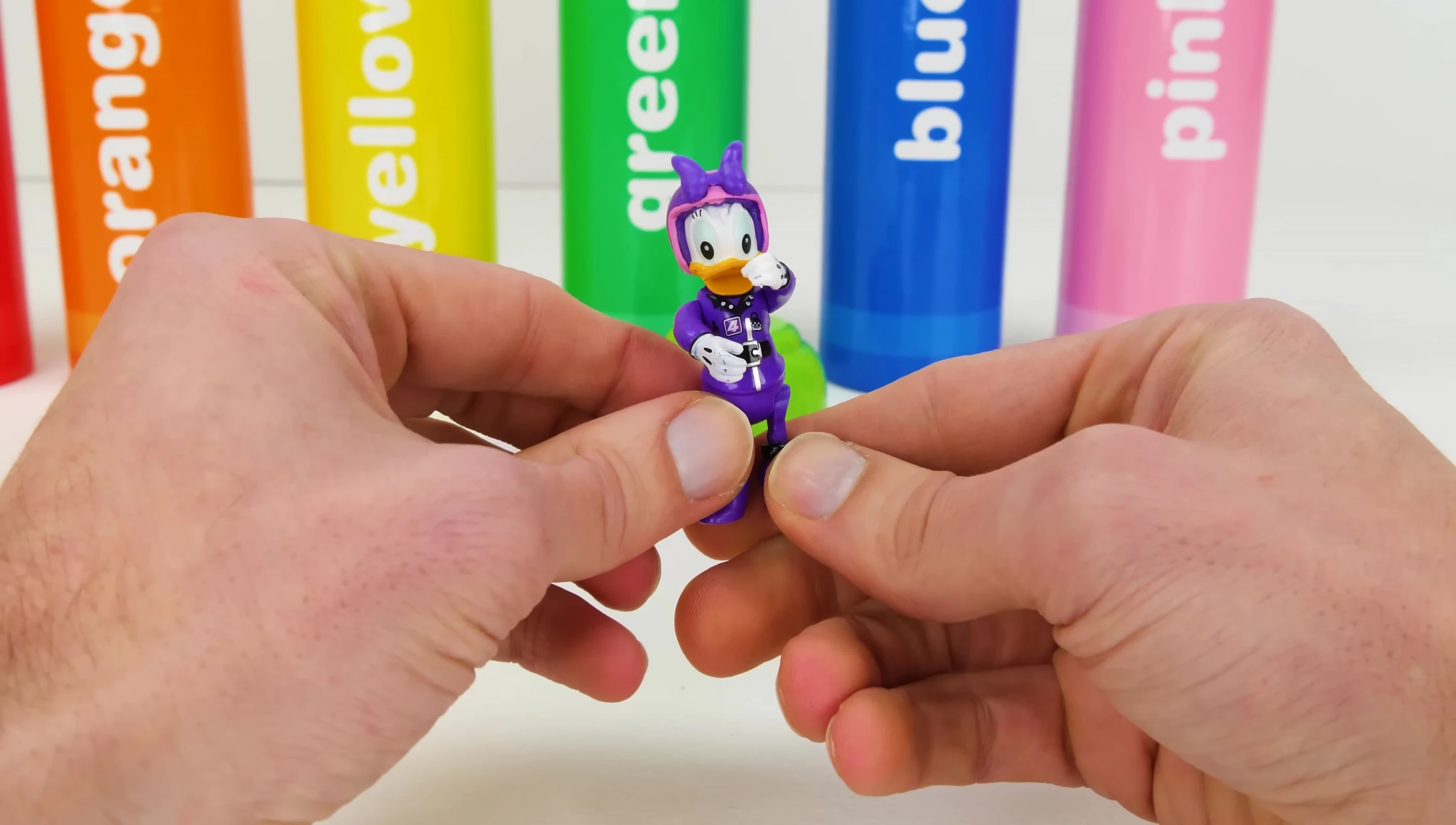 Daisy Duck, Petty, and purple ice cream revealed from purple crayon