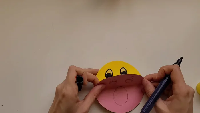 Label each emotion beneath its corresponding face.