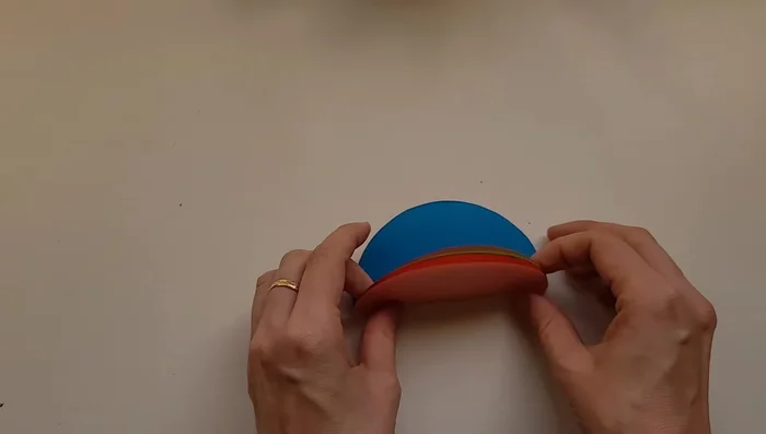 Add an extra circle to the outside to hold the stack together and write 'Feelings' on it.